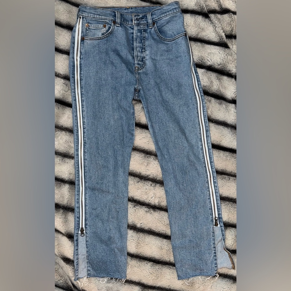 Levi's Blue Jeans with zippers down sides